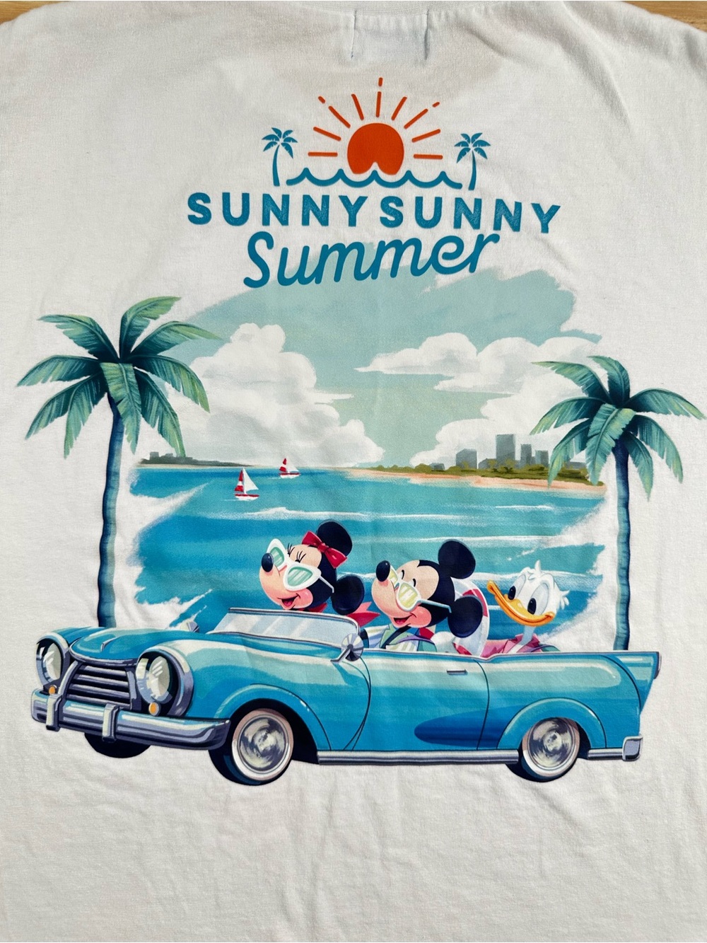 Disney White Tee with Blue Convertible and Orange Sun Graphic